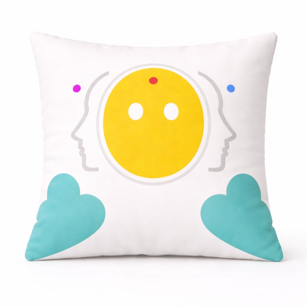 Almohada Essential de Zeøna: óvalo amarillo entre dos perfiles y corazones turquesa